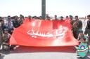 مراسم اهتزاز پرچم گنبد امام حسین(ع) در مصلای میبد